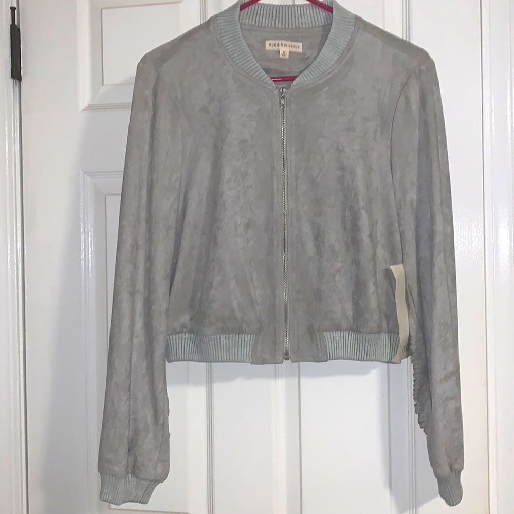 Grey faux suede Hot & delicious zip up jacket. Frayed cuts down back of jacket.